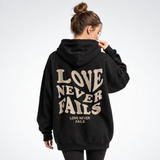 Carlena | Bluza Oversize z Nadrukiem „Love Never Fails”