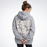 Carlena | Bluza Oversize z Nadrukiem „Love Never Fails”