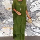 Carlena | Zwiewna sukienka maxi z falbanami maskująca brzuch i zapewniająca komfort