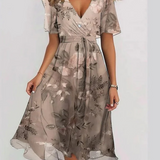 Carlena | Letnia Sukienka Boho-Chic z Kwiatowym Printem