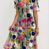 Carlena | Letnia Sukienka Boho-Chic z Kwiatowym Printem