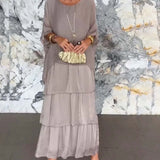 Carlena | Zwiewna sukienka maxi z falbanami maskująca brzuch i zapewniająca komfort