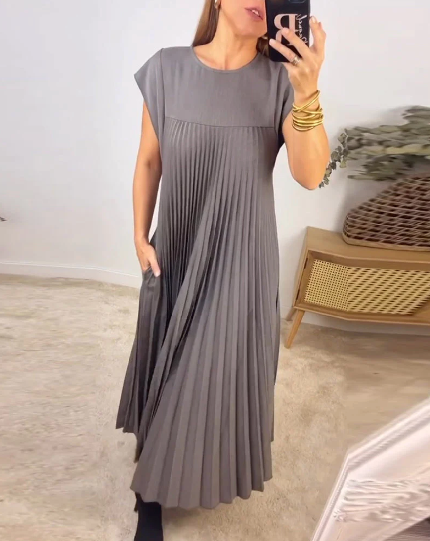 Carlena | Elegancka plisowana sukienka midi z kieszeniami