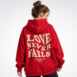 Carlena | Bluza Oversize z Nadrukiem „Love Never Fails”