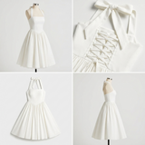 Carlena | Elegancka Sukienka Midi Halter z Rozkloszowaną Spódnicą i Kieszeniami