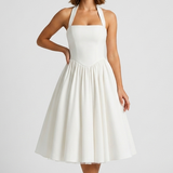 Carlena | Elegancka Sukienka Midi Halter z Rozkloszowaną Spódnicą i Kieszeniami