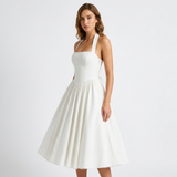 Carlena | Elegancka Sukienka Midi Halter z Rozkloszowaną Spódnicą i Kieszeniami