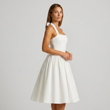 Carlena | Elegancka Sukienka Midi Halter z Rozkloszowaną Spódnicą i Kieszeniami