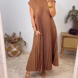 Carlena | Elegancka plisowana sukienka midi z kieszeniami